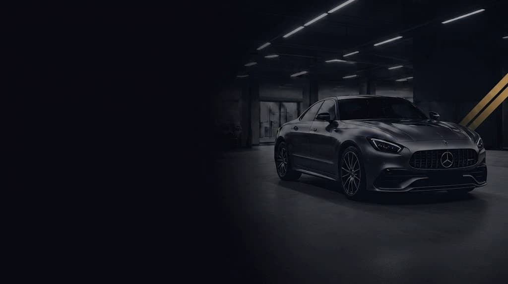 Mercedes AMG GT in a dark showroom