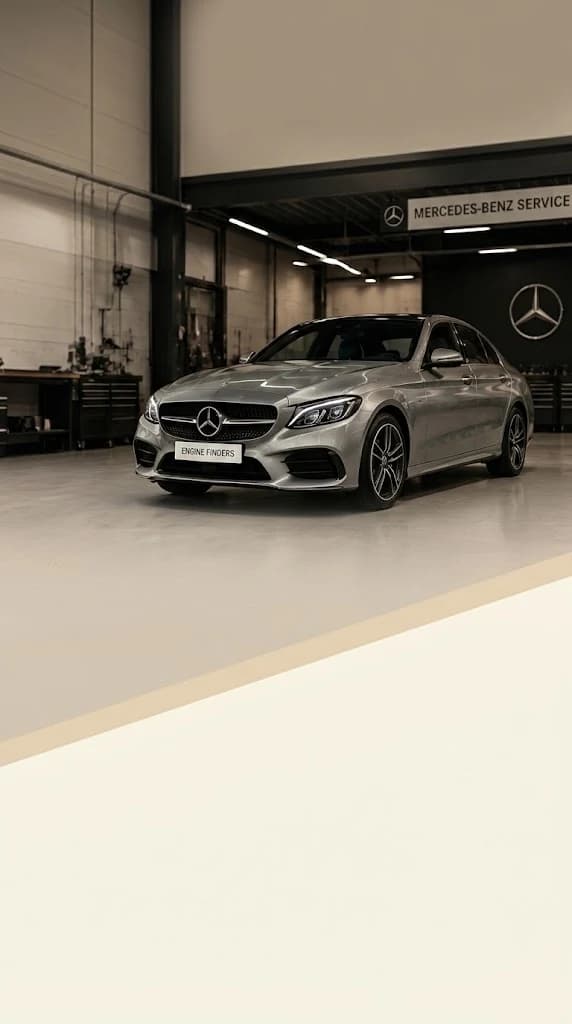 Mercedes C-Class in a bright Mercedes specialist workshop
